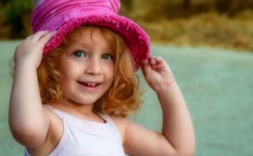 Cute girl with pink hat